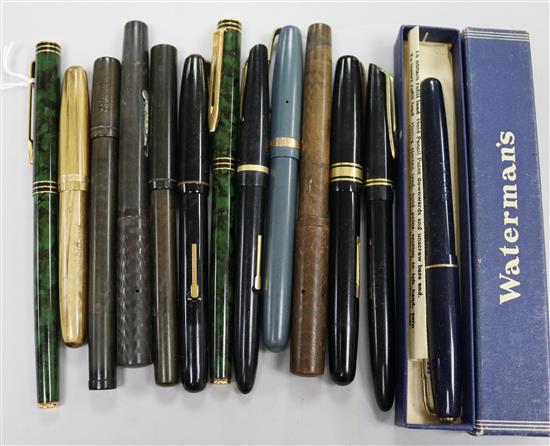 A group of thirteen Watermans fountain pens